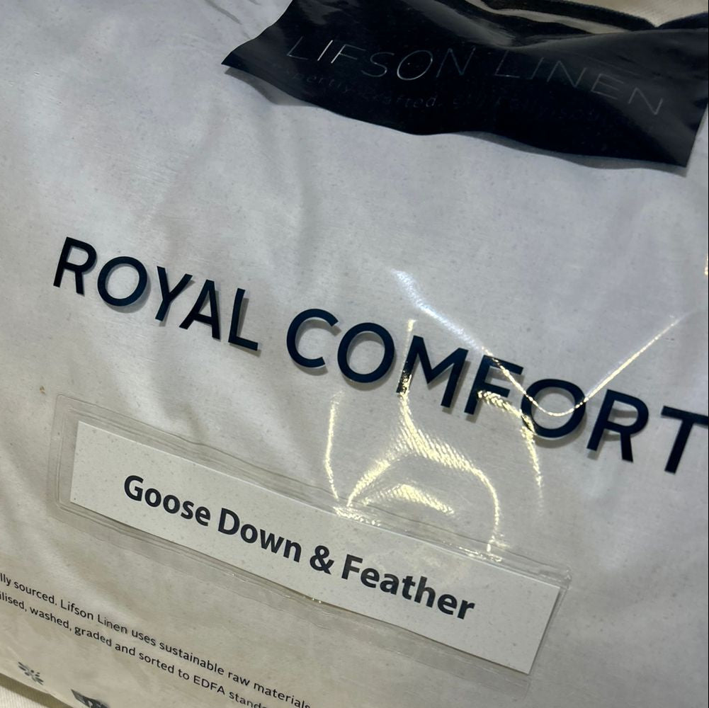 Royal Comfort goose down and feather product packaging with visible branding.