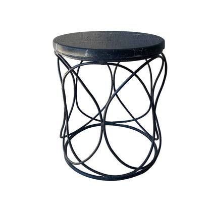 Small round table with black marble top and metal base 