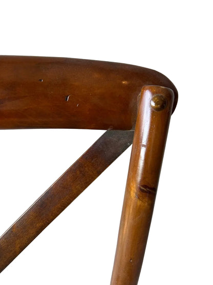 Wooden chair with a woven seat cross back