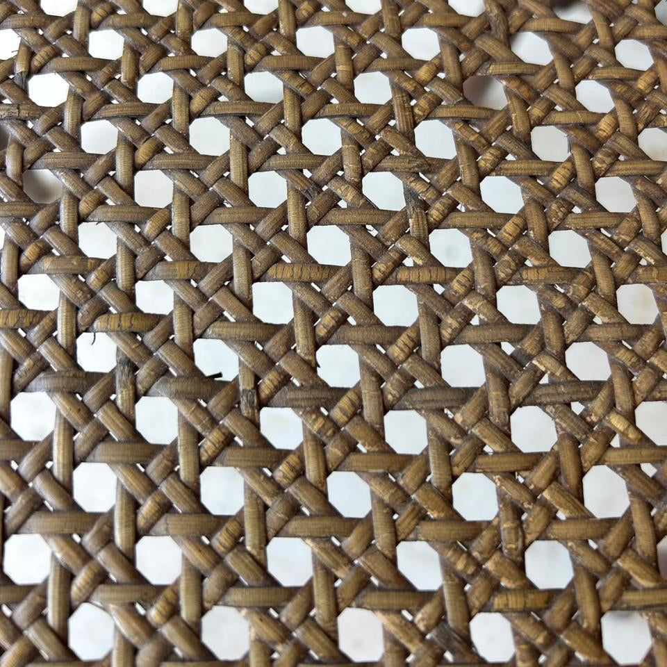 Close-up of a woven mat with a star pattern
