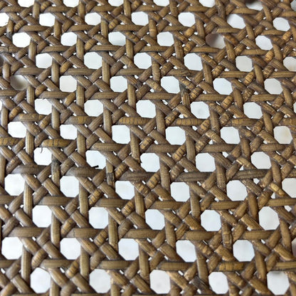 Close-up of a woven mat with a star pattern