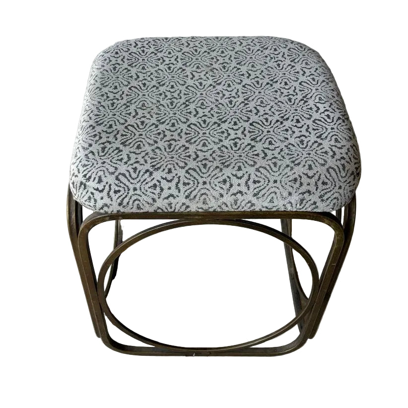 Small foot stool with patterned cushion