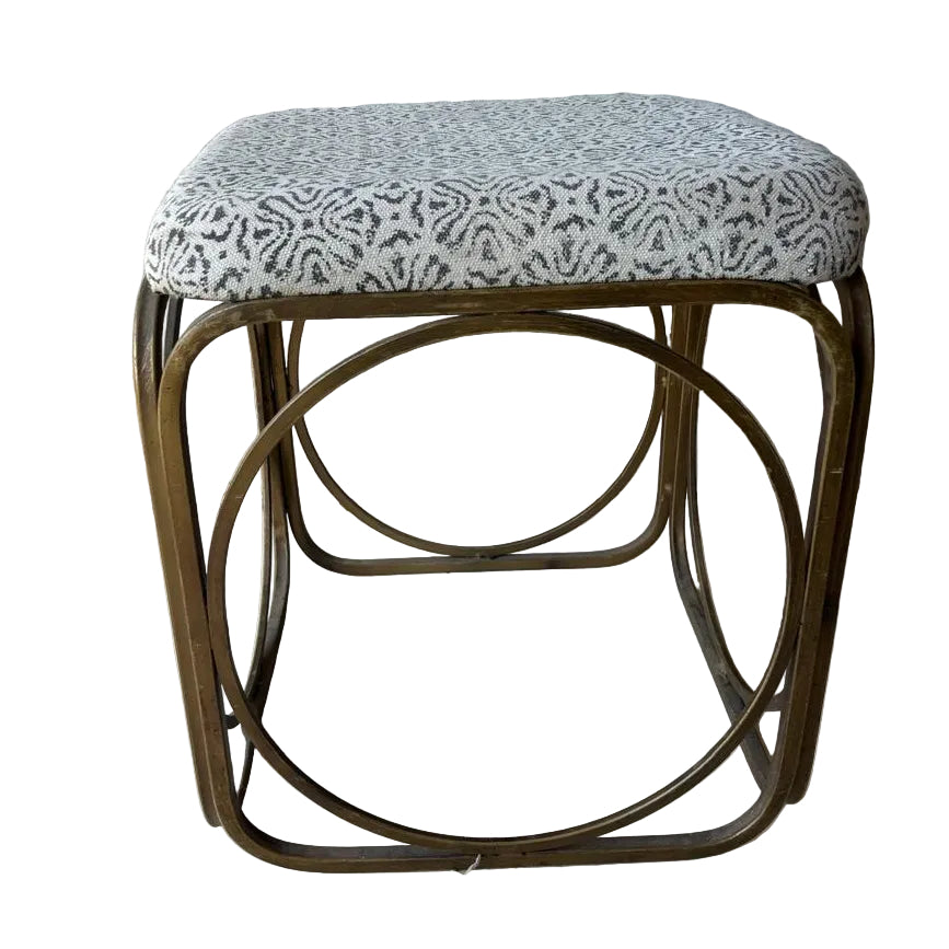 Small foot stool with patterned cushion