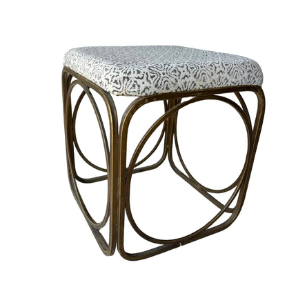 Small foot stool with patterned cushion