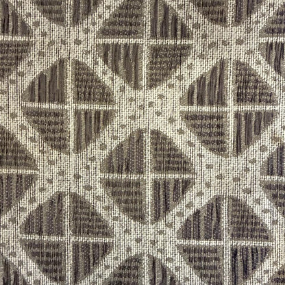 Textured fabric with geometric pattern in brown and beige tones