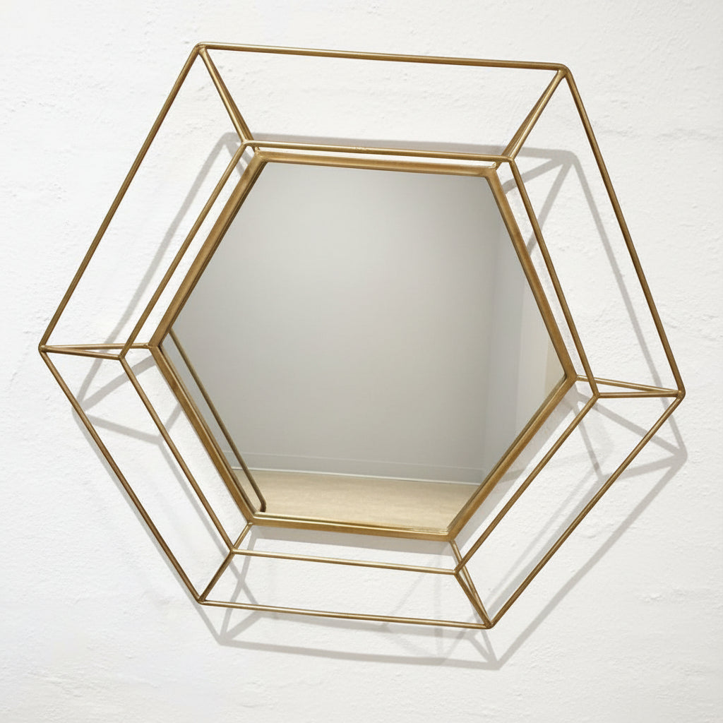 Hexagonal gold-framed mirror