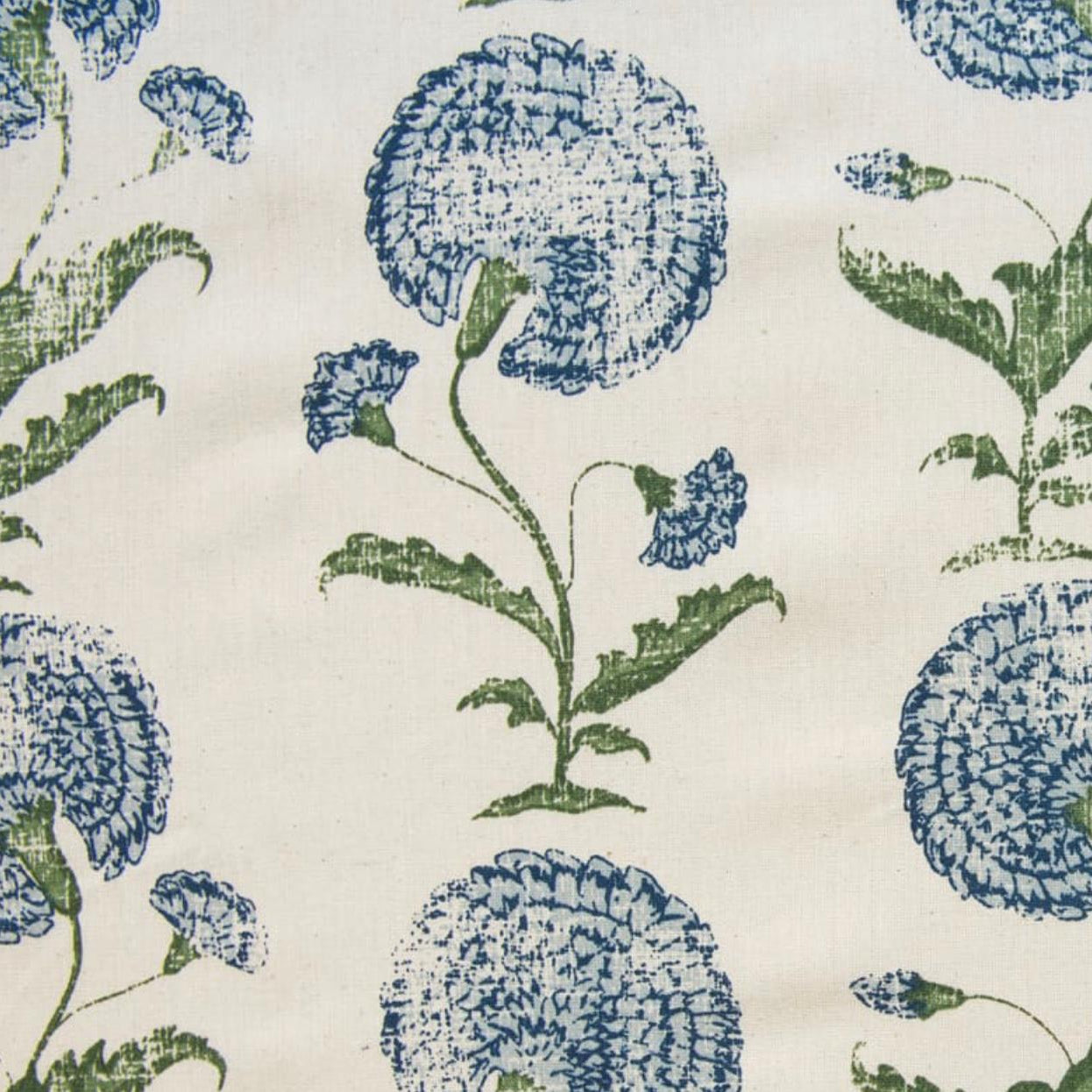 Pattern of blue flowers and green leaves on a beige background