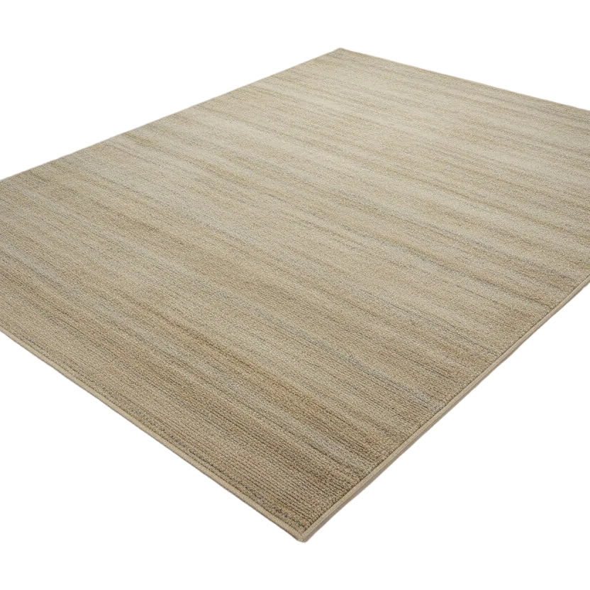Beige area rug on a white background

